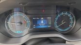 Car dashboard showing an EV gauge on the left, speedometer on the right, and a central display reading 'Driver Seatbelt Not Fasten' with status 'READY' and 73 km range.