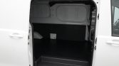 Open white cargo van with an empty black loading area