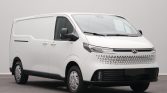 White cargo van pictured from a front-side angle, showcasing a modern grille and black bumpers/trim. Used for commercial transport or delivery.
