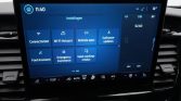 In-car infotainment touchscreen showing the Settings menu with tiles for Connectivity, Wi‑Fi hotspot, Mobile apps, Software updates, Ford Assistant, Emergency Assistance, Valet mode; FM radio panel on the right, time 11:40 and temp 14°C visible.
