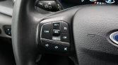 Left side of the steering wheel with cruise control buttons: CAN, SET+, RES, SET-, LIM, and audio controls.