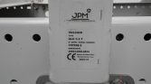 Close-up of a machinery label on a white steel beam showing JPM logo, 'VULCAIN', 'ALU 3.5 T', serial 107938-2, CE mark, year 2021/37. This is an informative label for a piece of industrial equipment.