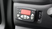 Truck refrigeration unit controller with red LED display and SET/+/−/ON/OFF buttons mounted on the dashboard panel