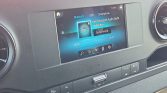 Car infotainment touchscreen showing Bluetooth settings with 'No Bluetooth audio device connected' and 'Add device' button.