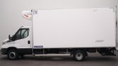 Side view of a white refrigerated box truck with a large cargo box and refrigeration unit on top, in a studio setting.