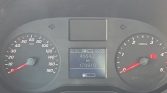 Car dashboard with speedometer on left (0–180 km/h), tachometer on right (0–5x1000 rpm), and a central LCD showing trip 4,664.2 km and total 170,810 km; temp 22.5°C and time 09:35; parking brake indicator lit on the right.