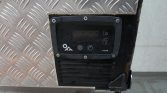 Control panel with a digital display and up/down arrows, power, and settings buttons on a diamond-plate metal surface.