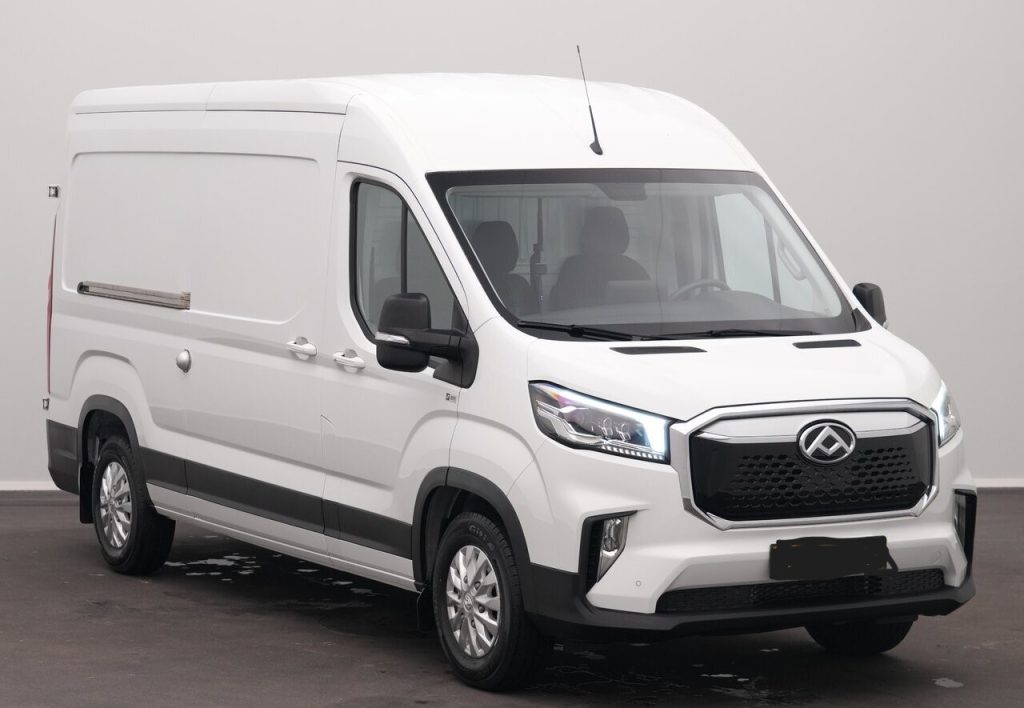 White high-roof cargo van shown from a front three-quarter angle, with a black grille and modern headlights.