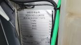 Vehicle identification/weight plate on a truck showing model and axle weights: IVECO S.p.A., RDW-IND-0108233, weights 11990 kg and 15490 kg, axle loads 4600 kg and 8500 kg, wheelbase 4285, engine F4AFE611A, power 162 kW, made in Italy.