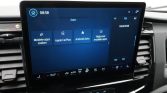 In-car touchscreen displaying the Apps menu with options for Mobile apps search, Apple CarPlay, Android Auto, and Help for mobile apps; radio panel on the right.]