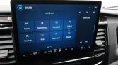 Car infotainment touchscreen displaying the Settings menu with tiles: Radio, Telefoonlijst, Navigatie, Geluid, Voertuig, Klok, Algemeen, Display; radio RADIO538 on the right.