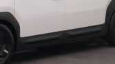 Side view of a white vehicle showing black lower body cladding, door with handle, and wheels along the bottom edge.